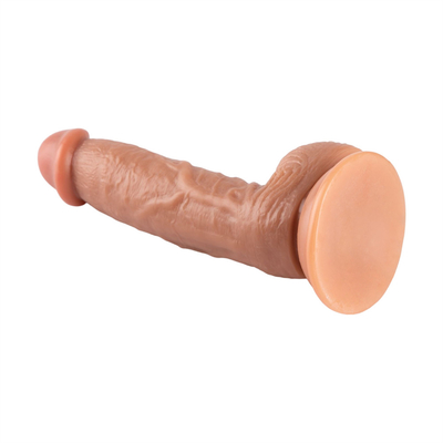 Un énorme dildo artificiel super épais avec une bouteille d'aspiration et un bouchon de cul.